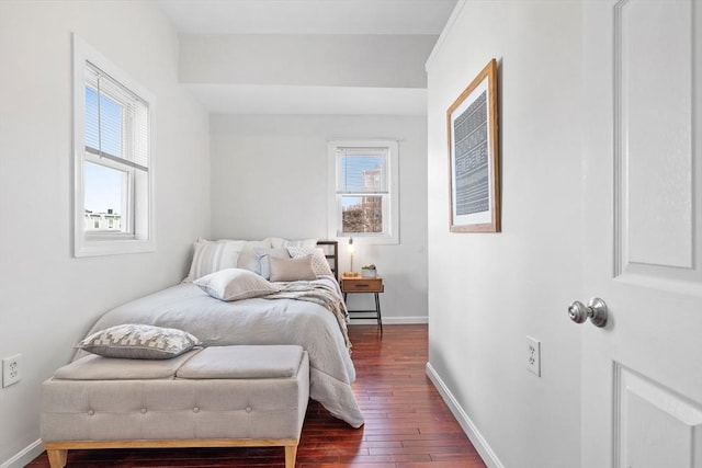 bedroom featuring dark hardwood / wood-style flooring