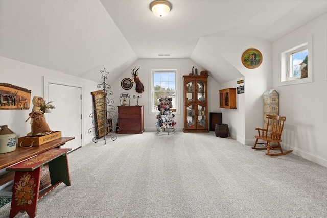 4 Curley Cir, Ayer, MA 01432 - living area featuring carpet floors, baseboards, and lofted ceiling