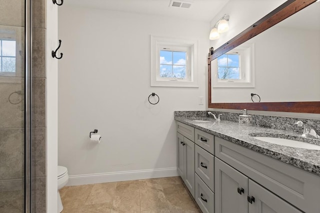 4 Curley Cir, Ayer, MA 01432 - full bath with visible vents, a sink, double vanity, and toilet