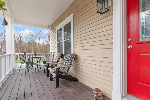 4 Curley Cir, Ayer, MA 01432 - wooden deck featuring a porch and outdoor dining space