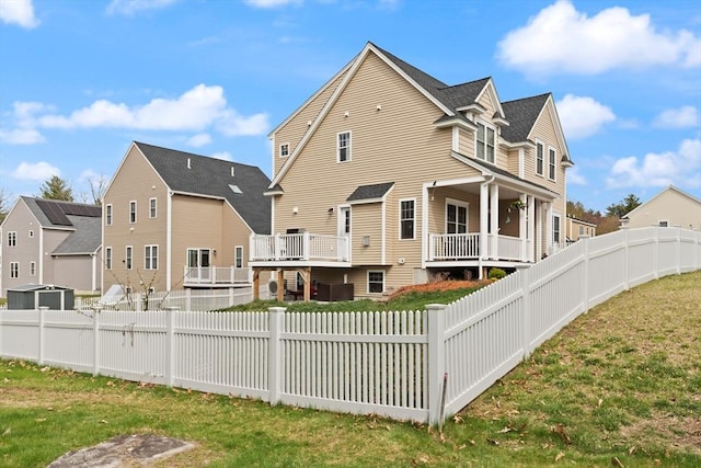 4 Curley Cir, Ayer, MA 01432 - rear view of property with fence private yard and a lawn