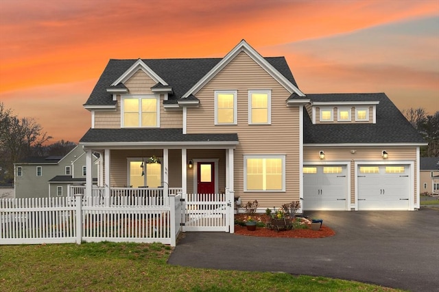 4 Curley Cir, Ayer, MA 01432 - traditional-style home with a porch, a shingled roof, aphalt driveway, and fence