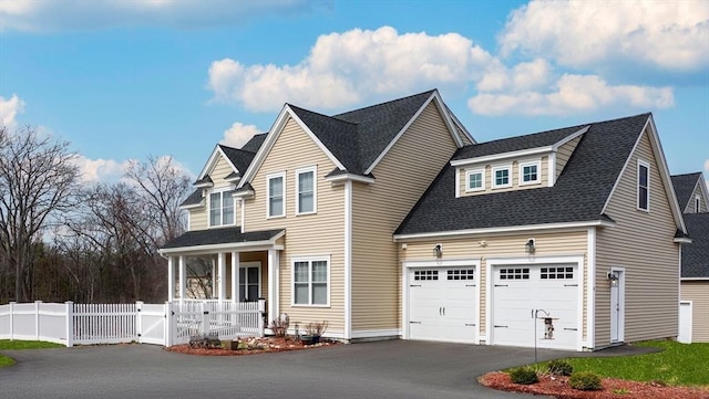 4 Curley Cir, Ayer, MA 01432 - traditional-style house with fence, a shingled roof, a gate, covered porch, and driveway