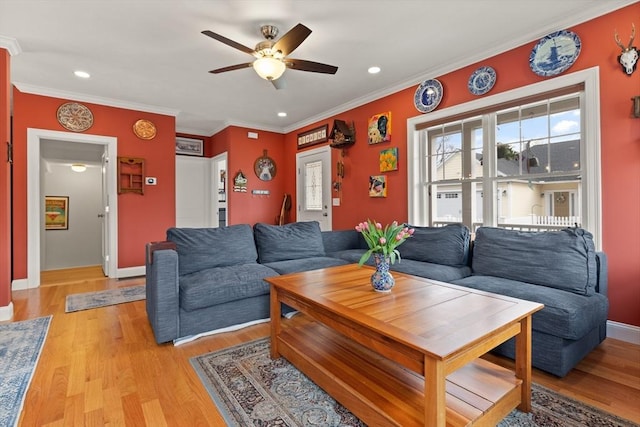 4 Curley Cir, Ayer, MA 01432 - living room with crown molding, ceiling fan, and light wood-style flooring