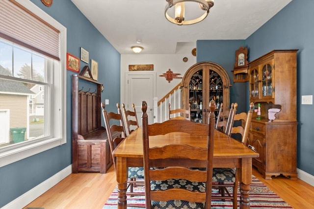 4 Curley Cir, Ayer, MA 01432 - dining space with stairs, baseboards, and light wood-style floors