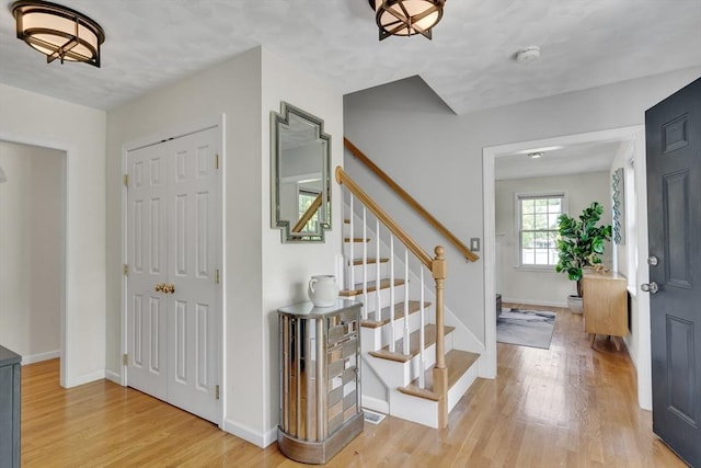7 Sequoia Dr, Wilmington, MA 01887 - foyer entrance featuring stairs, light wood-type flooring, and baseboards