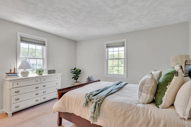 7 Sequoia Dr, Wilmington, MA 01887 - bedroom with light carpet and a textured ceiling