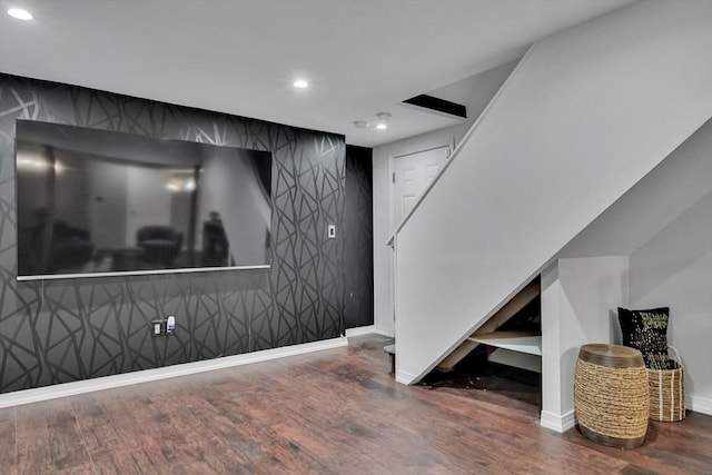7 Sequoia Dr, Wilmington, MA 01887 - basement featuring wood finished floors, recessed lighting, an accent wall, baseboards, and stairway