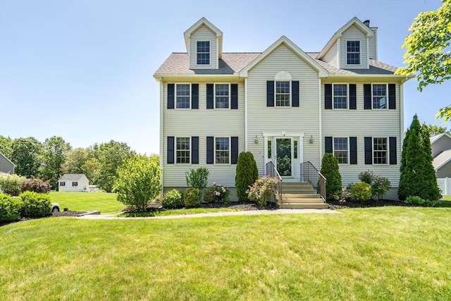 7 Sequoia Dr, Wilmington, MA 01887 - colonial house featuring a front yard and a chimney