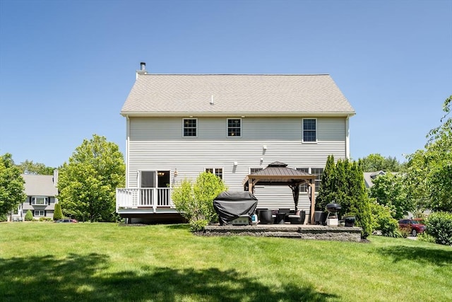 7 Sequoia Dr, Wilmington, MA 01887 - rear view of house with a gazebo, a lawn, and a wooden deck