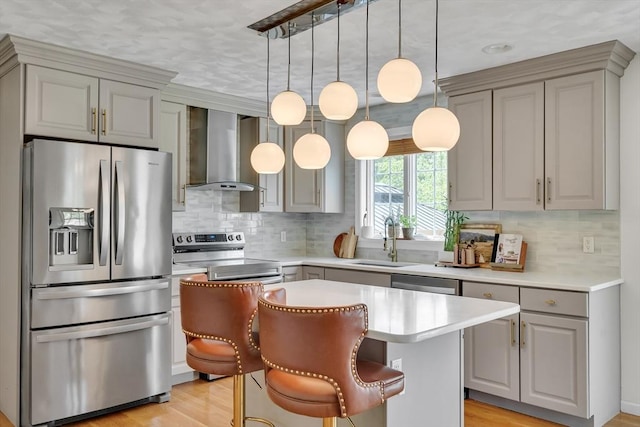 7 Sequoia Dr, Wilmington, MA 01887 - kitchen featuring appliances with stainless steel finishes, wall chimney range hood, a sink, gray cabinetry, and light countertops