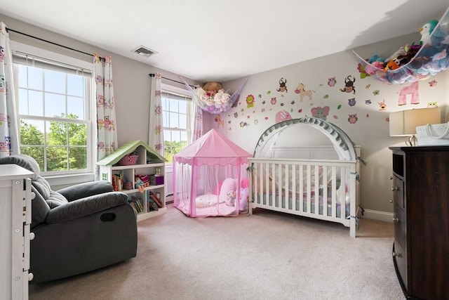3 42nd St, Berkley, MA 02779 - carpeted bedroom featuring multiple windows and a nursery area