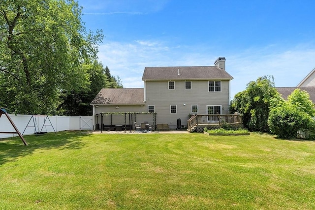 3 42nd St, Berkley, MA 02779 - back of house featuring a gate, a fenced backyard, a chimney, a patio, and a deck