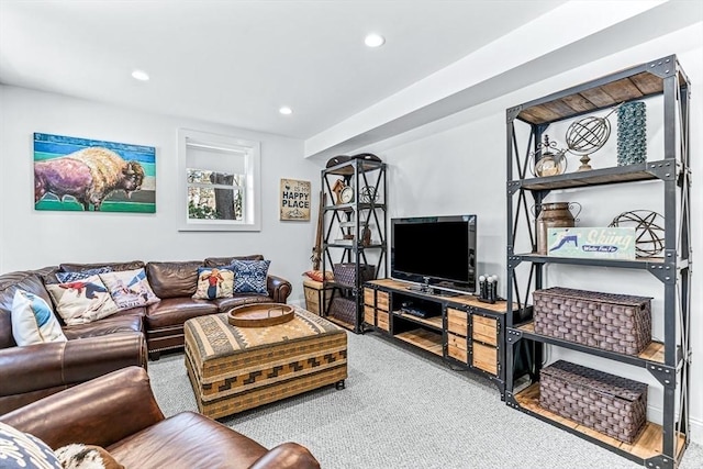 living room featuring recessed lighting and light carpet