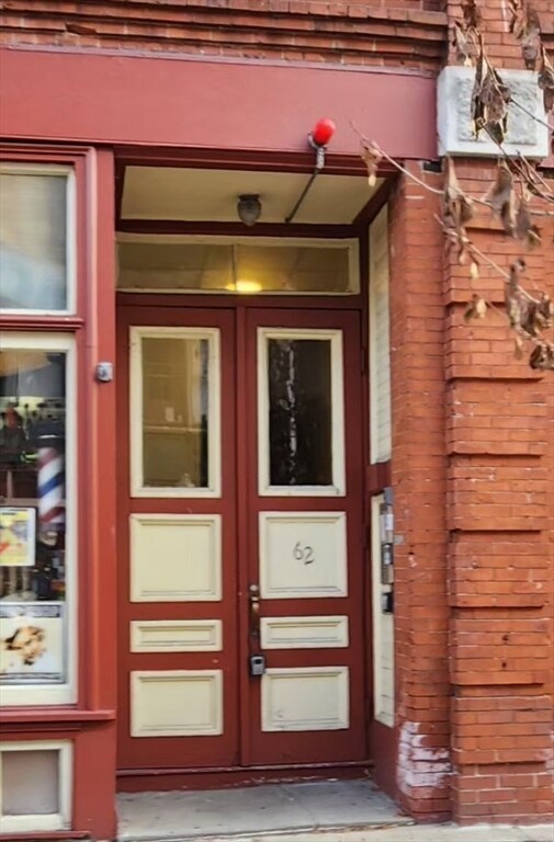 entrance to property featuring french doors