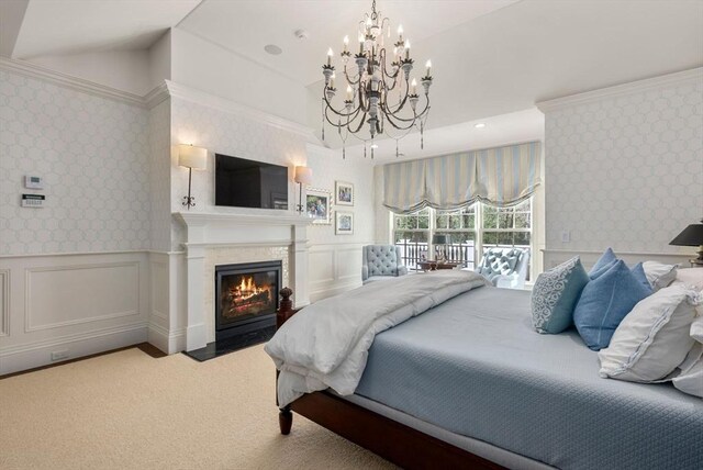 carpeted bedroom featuring access to exterior and vaulted ceiling