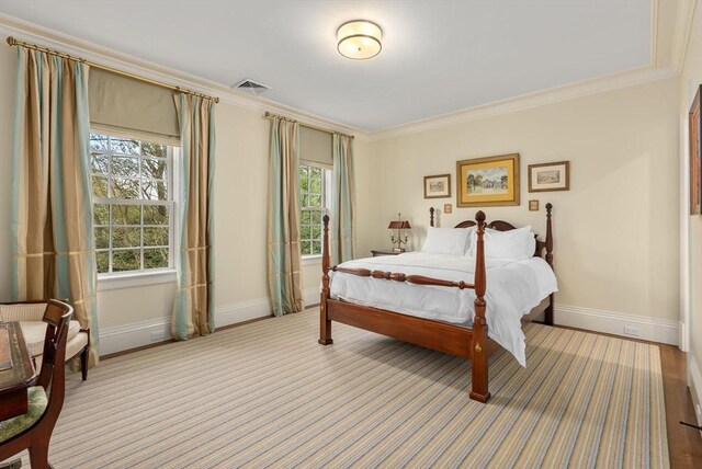 bedroom featuring ornamental molding