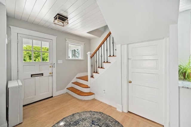 993 Shirley St, Winthrop, MA 02152 - foyer featuring light wood-style flooring, stairway, wooden ceiling, and baseboards