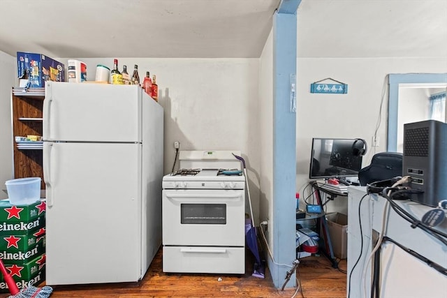 kitchen with wood-type flooring and white appliances