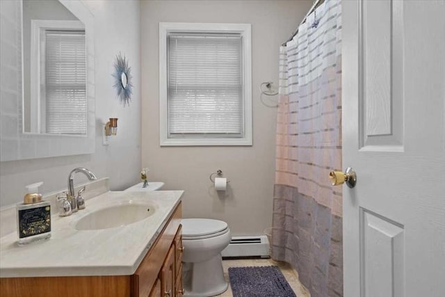 bathroom featuring a baseboard radiator, vanity, toilet, and curtained shower