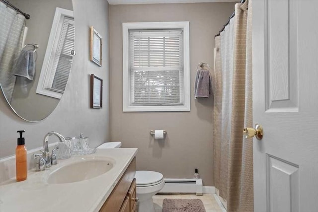 bathroom featuring a baseboard radiator, vanity, and toilet