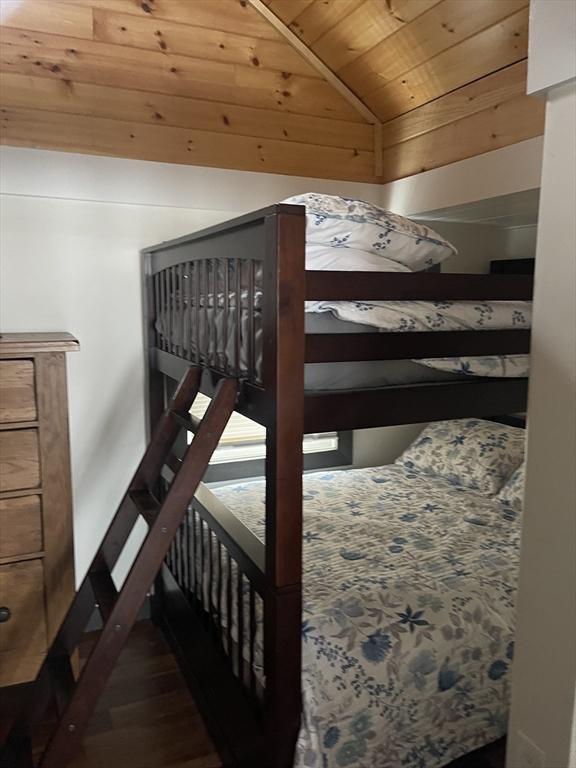 134 Kibbe Rd, Otis, MA 01029 - bedroom featuring wood ceiling, wood finished floors, and lofted ceiling