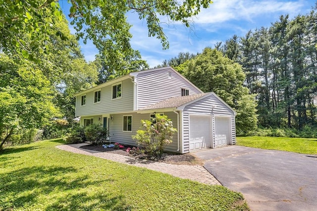 47 Churchill St, Sudbury, MA 01776 - colonial-style house with a garage, a front lawn, and driveway