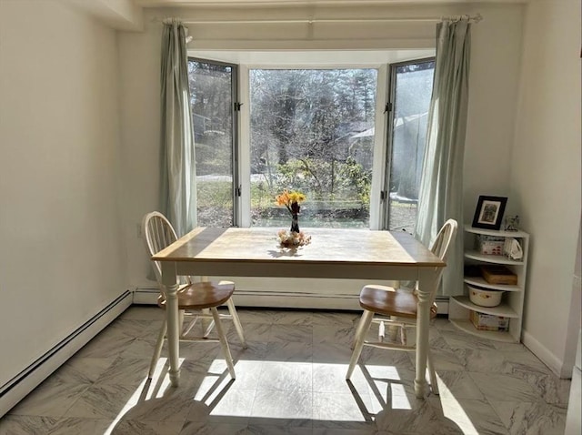 47 Churchill St, Sudbury, MA 01776 - dining room featuring baseboard heating, plenty of natural light, and marble finish flooring
