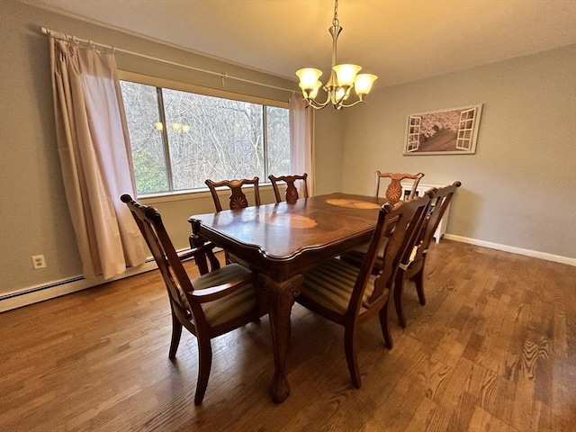 47 Churchill St, Sudbury, MA 01776 - dining room with a chandelier and wood finished floors