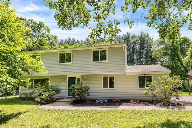 47 Churchill St, Sudbury, MA 01776 - colonial inspired home featuring a front lawn