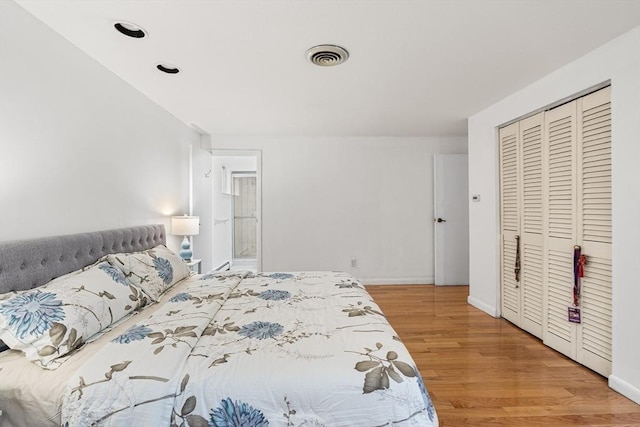 47 Churchill St, Sudbury, MA 01776 - bedroom featuring wood finished floors and a closet