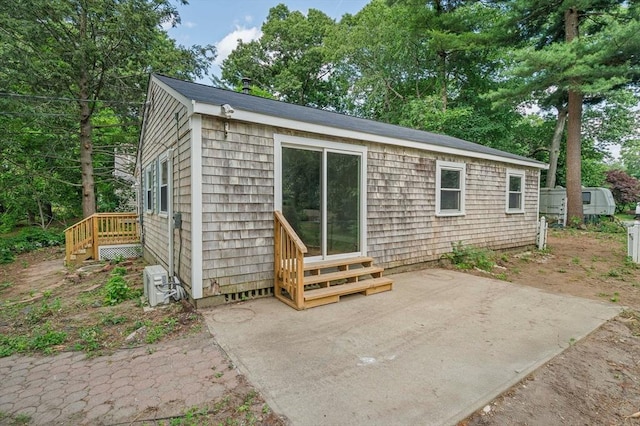 13 Hickory Rd, Halifax, MA 02338 - back of property featuring a patio area and entry steps