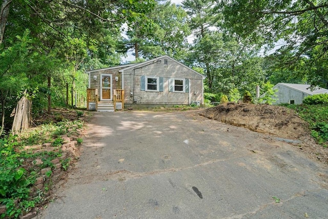 13 Hickory Rd, Halifax, MA 02338 - view of front of house with asphalt driveway