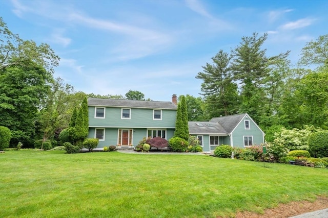 35 Faulkner Hill Rd, Acton, MA 01720 - colonial-style house with a chimney and a front yard