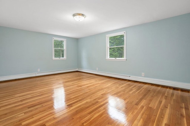 35 Faulkner Hill Rd, Acton, MA 01720 - unfurnished room with plenty of natural light, wood finished floors, and baseboard heating