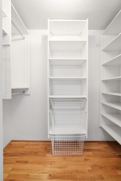 35 Faulkner Hill Rd, Acton, MA 01720 - spacious closet featuring wood finished floors