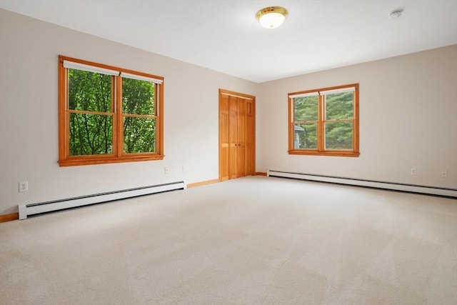 35 Faulkner Hill Rd, Acton, MA 01720 - empty room featuring baseboard heating, plenty of natural light, and carpet floors