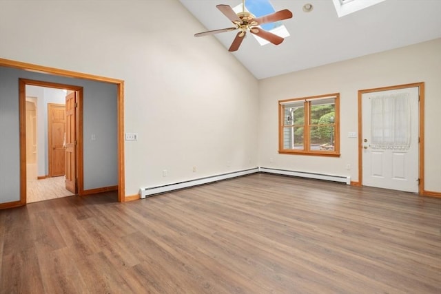 35 Faulkner Hill Rd, Acton, MA 01720 - spare room with wood finished floors, a baseboard heating unit, high vaulted ceiling, and a ceiling fan