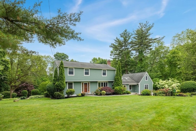 35 Faulkner Hill Rd, Acton, MA 01720 - colonial-style house with a chimney and a front yard