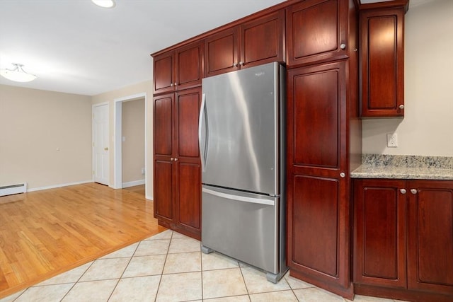 35 Faulkner Hill Rd, Acton, MA 01720 - kitchen featuring freestanding refrigerator, reddish brown cabinets, light wood-type flooring, and recessed lighting