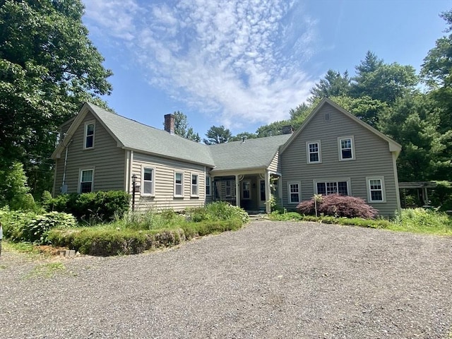 387 W Washington St, Hanson, MA 02341 - view of front of property with a chimney and driveway