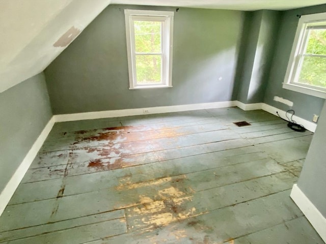 387 W Washington St, Hanson, MA 02341 - bonus room featuring baseboards and vaulted ceiling