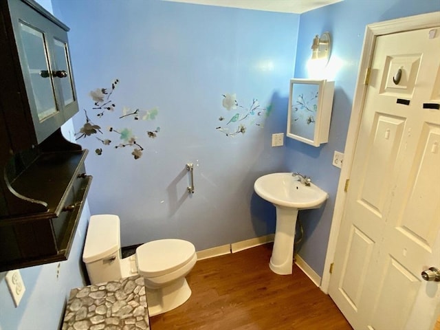 387 W Washington St, Hanson, MA 02341 - half bath with toilet and wood finished floors