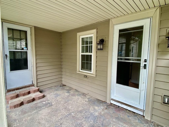 387 W Washington St, Hanson, MA 02341 - doorway to property featuring a patio