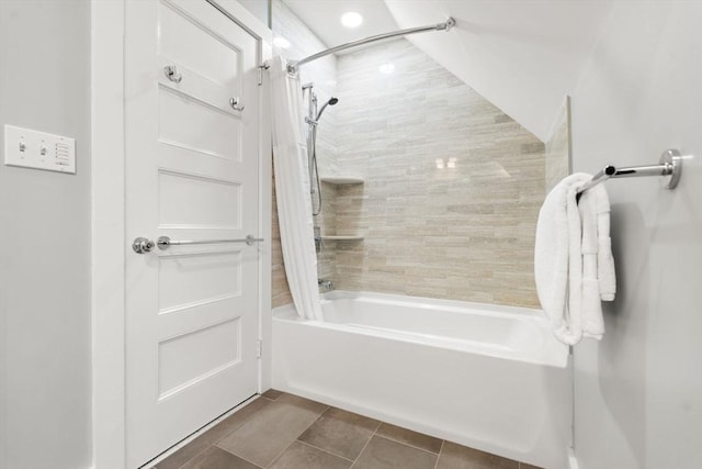 full bathroom with shower / bath combo with shower curtain and tile patterned flooring