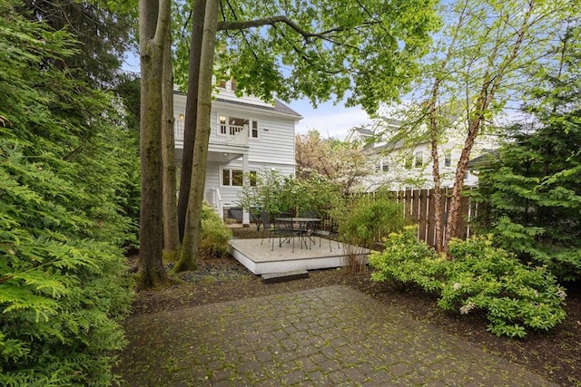 view of patio / terrace with fence and a deck