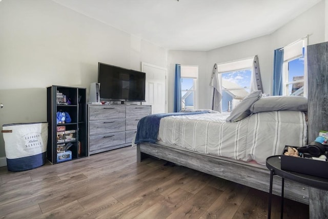 bedroom featuring wood finished floors