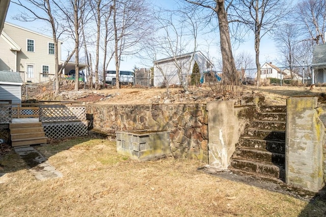 view of yard featuring a wooden deck