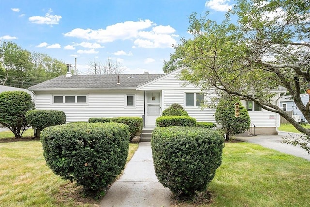 381 Water, Wakefield, MA 01880 - view of front of home featuring a front lawn and a shingled roof