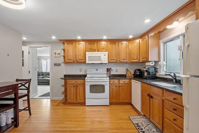 381 Water, Wakefield, MA 01880 - kitchen featuring white appliances, light wood finished floors, brown cabinetry, and recessed lighting